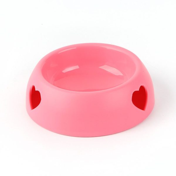 Cute plastic pet bowl with a heart-shaped hole