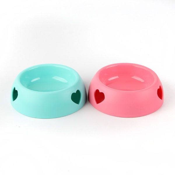 Cute plastic pet bowl with a heart-shaped hole