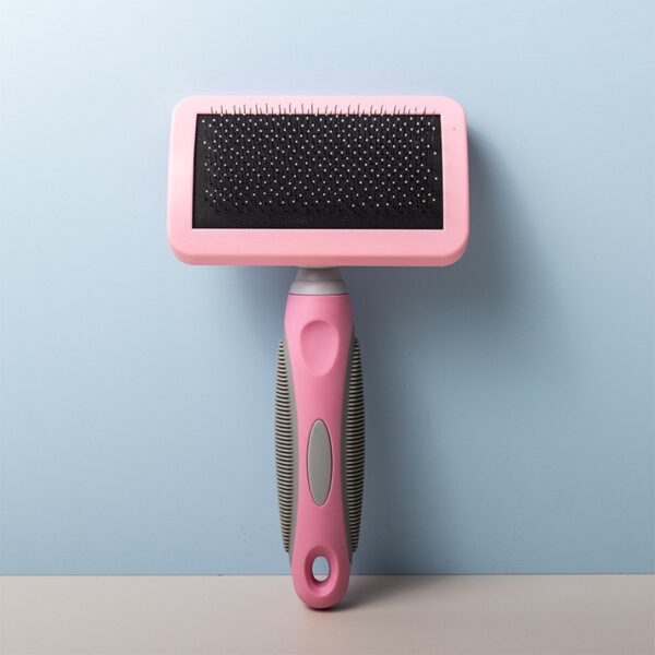 Soft grip slicker brush